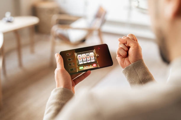 Dice Game interface on ledakwin mobile app showing prediction and stake entry